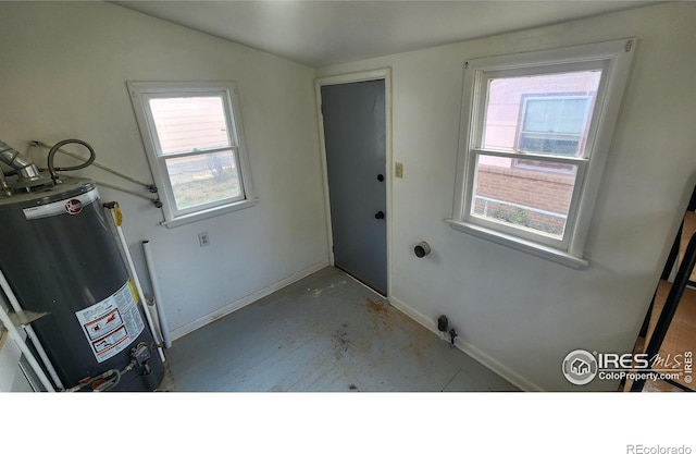 laundry room featuring gas water heater