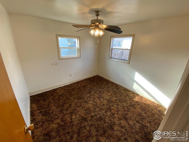 carpeted empty room with ceiling fan