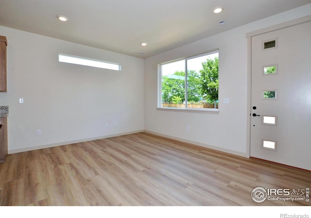 foyer entrance featuring light hardwood / wood-style floors