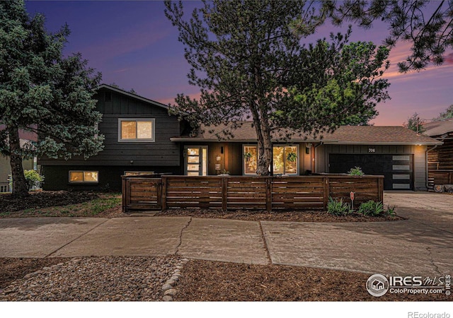 view of front of property with a garage