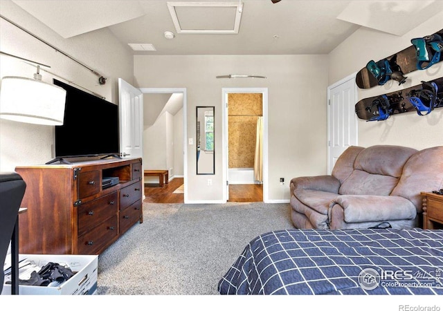 bedroom featuring carpet flooring and ensuite bath