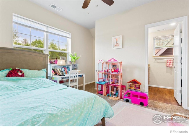 bedroom featuring ceiling fan and wood-type flooring