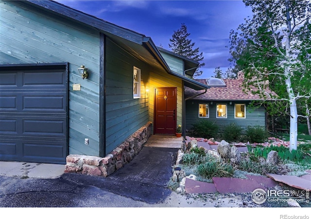 view of front of house with a garage