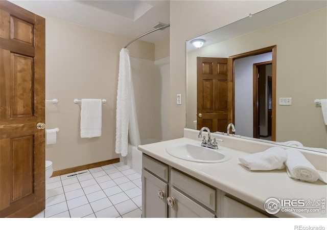 full bathroom with tile patterned floors, vanity, toilet, and shower / tub combo with curtain