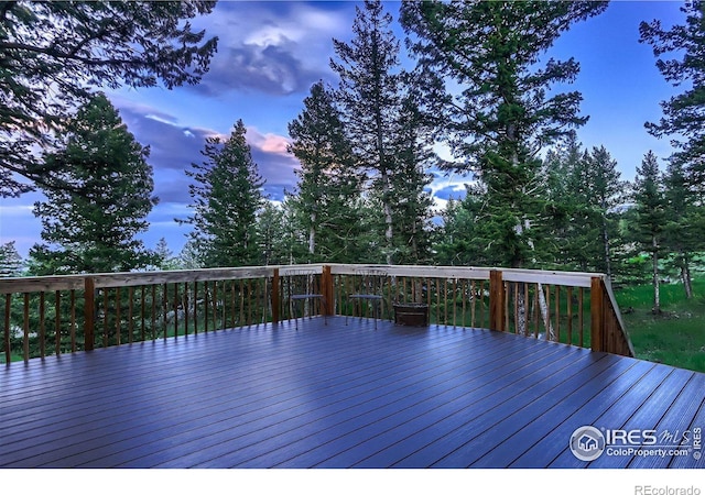 view of deck at dusk