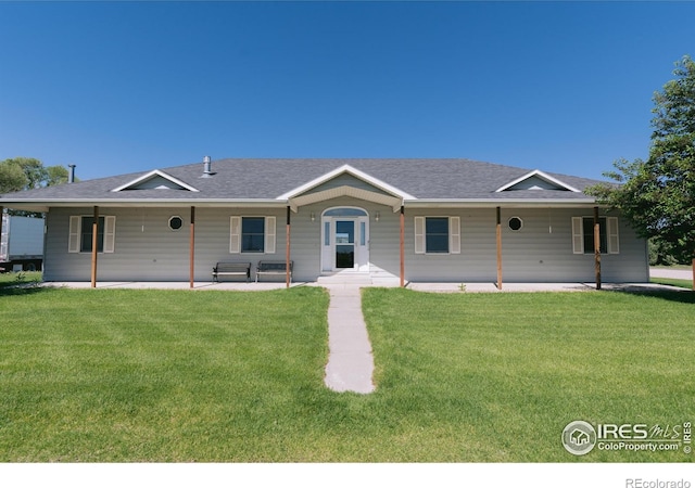 ranch-style house with a front yard