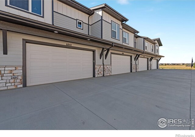 exterior space featuring a garage