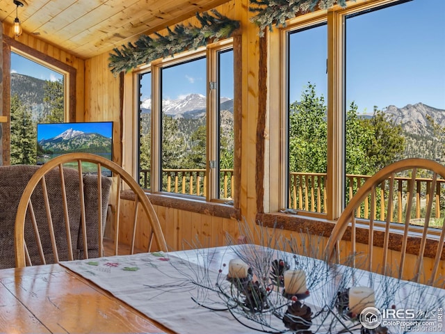 sunroom / solarium with wood ceiling