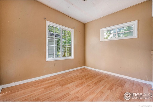 unfurnished room featuring light hardwood / wood-style floors