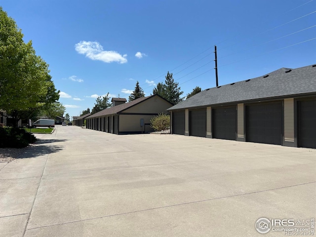 exterior space featuring an outdoor structure and a garage