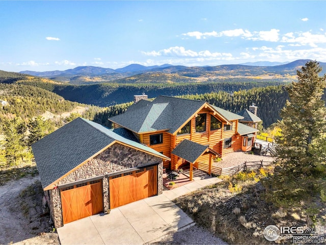 exterior space featuring a mountain view