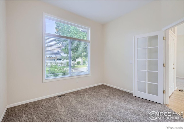 view of carpeted spare room