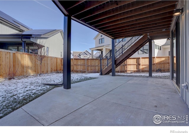 view of snow covered patio