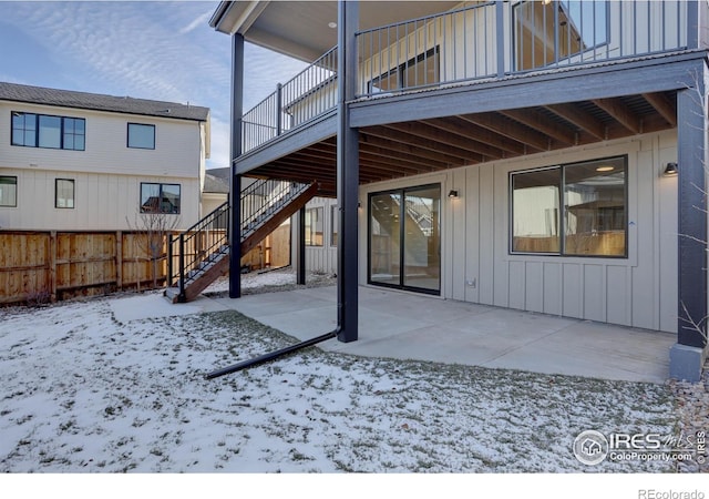 view of snow covered patio