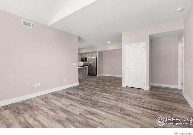 unfurnished living room featuring light hardwood / wood-style flooring