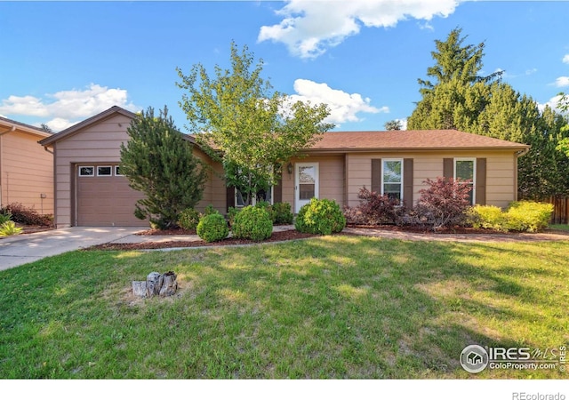 ranch-style home with a garage, a front yard, and driveway