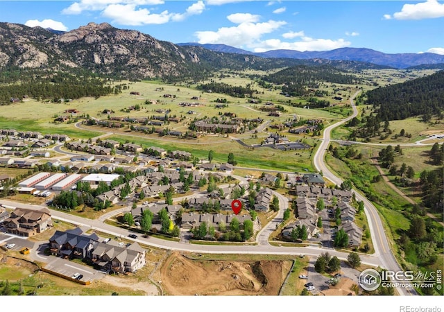 drone / aerial view with a residential view and a mountain view