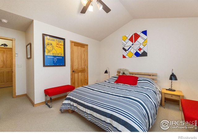 bedroom with vaulted ceiling, carpet flooring, a ceiling fan, and baseboards