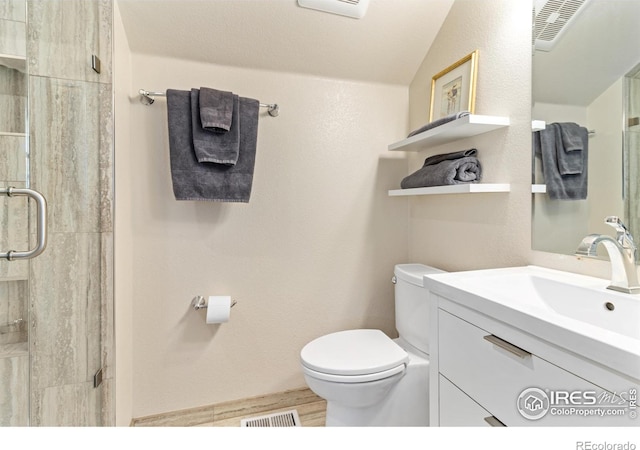 bathroom with lofted ceiling, walk in shower, vanity, and toilet