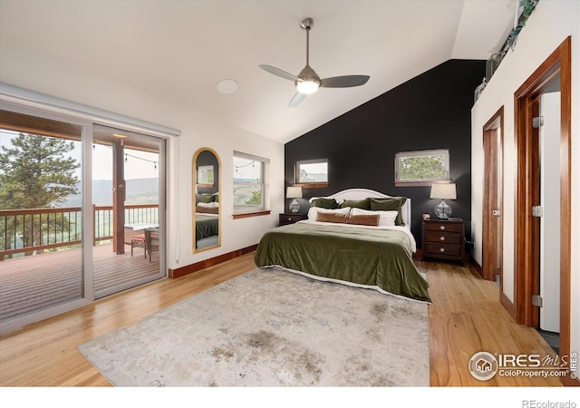 bedroom with ceiling fan, lofted ceiling, access to exterior, and light hardwood / wood-style flooring