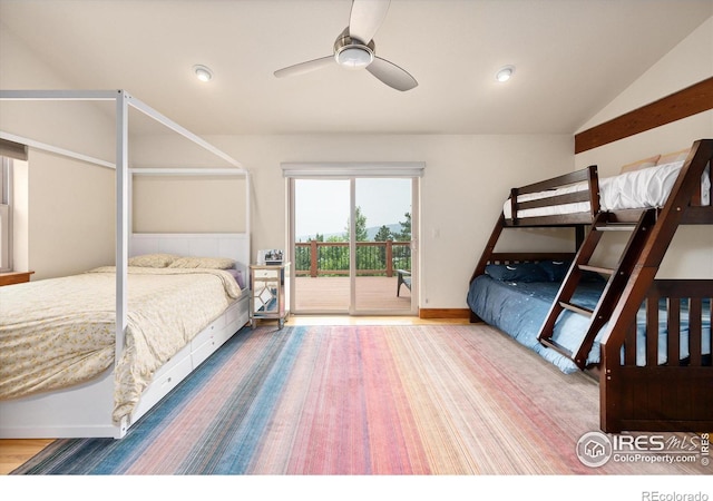 bedroom with ceiling fan, lofted ceiling, and access to outside