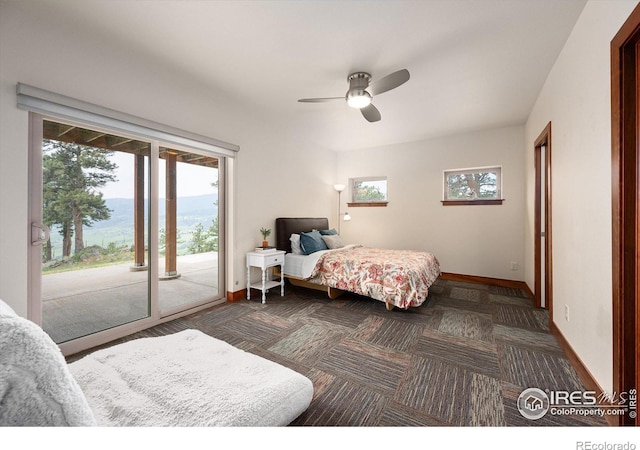 carpeted bedroom featuring access to exterior and ceiling fan