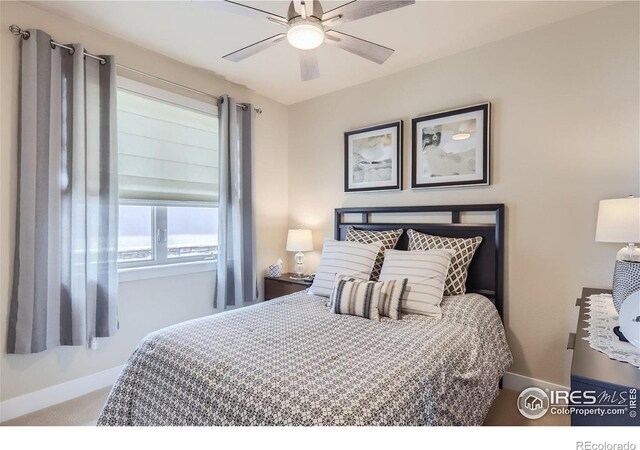 bedroom with carpet flooring and ceiling fan