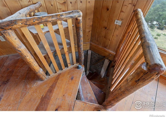 stairway with wood-type flooring