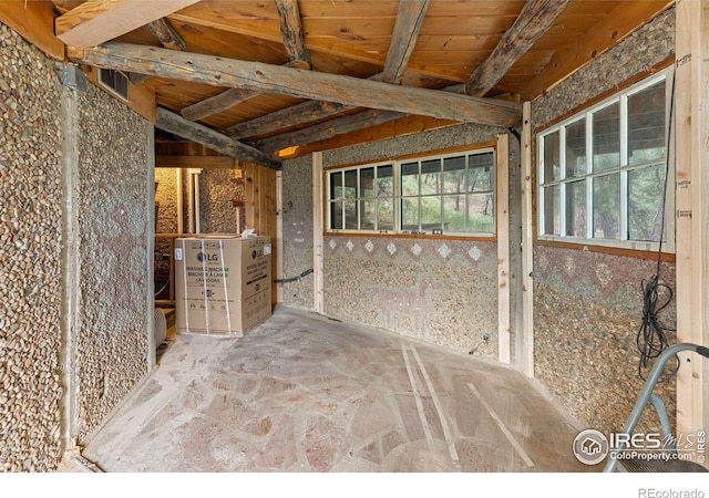 interior space with beam ceiling and wooden ceiling