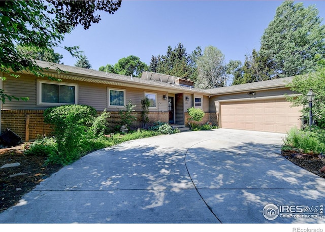 single story home with a garage