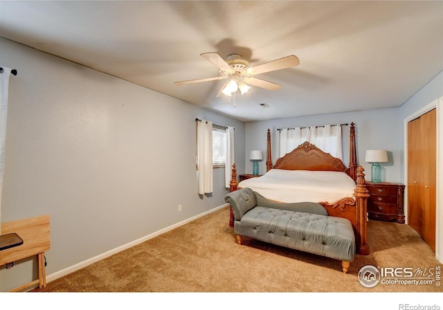 carpeted bedroom featuring ceiling fan