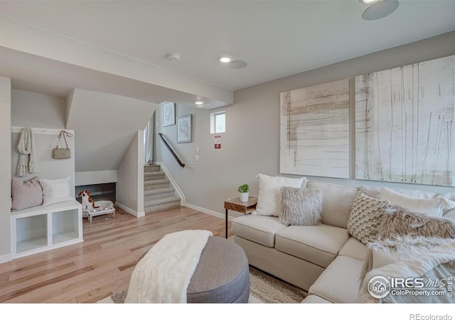 living room with light hardwood / wood-style flooring