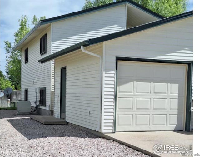 exterior space with a garage