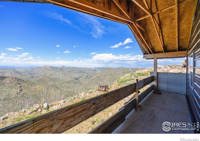 view of patio / terrace featuring a mountain view