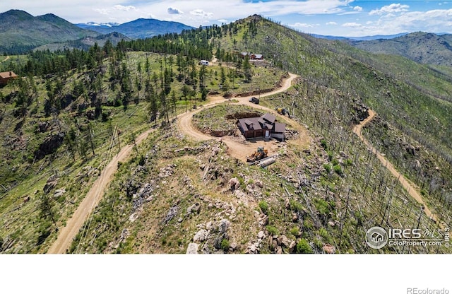 aerial view featuring a mountain view