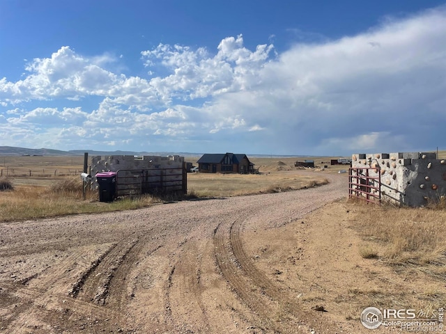 view of street featuring a rural view