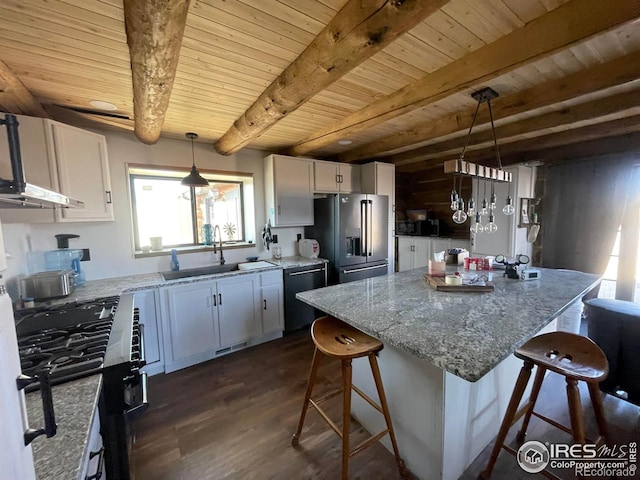 kitchen with white cabinets, dark wood-type flooring, and stainless steel refrigerator with ice dispenser