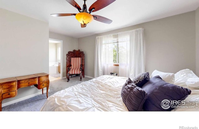 carpeted bedroom featuring connected bathroom and ceiling fan