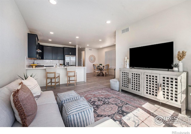 living room with dark wood-type flooring