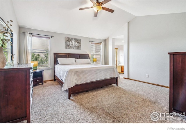 carpeted bedroom featuring connected bathroom, ceiling fan, and lofted ceiling