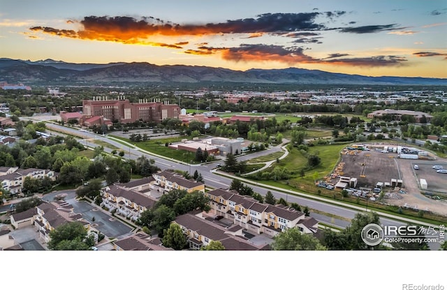 aerial view at dusk with a mountain view