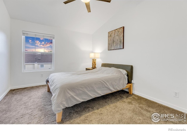 bedroom with lofted ceiling, carpet floors, and ceiling fan