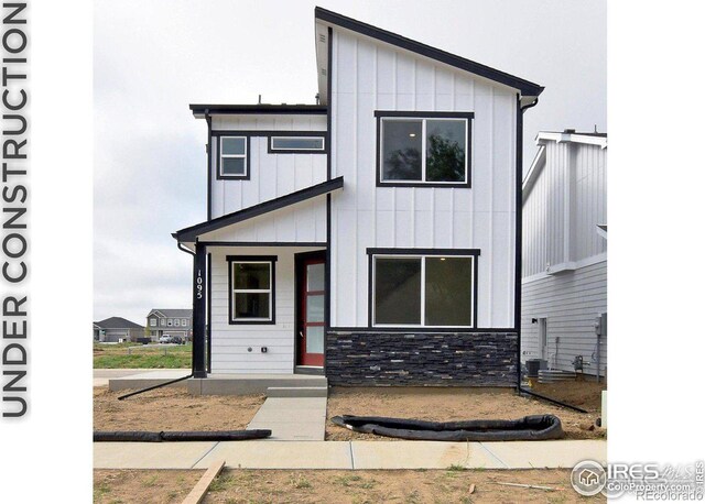 view of front of house featuring central AC