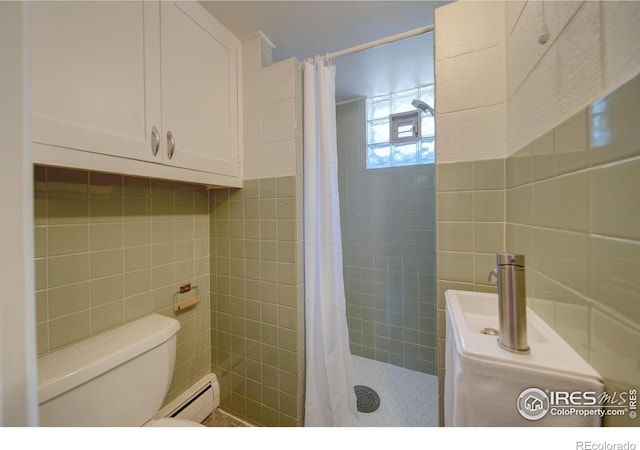 bathroom with backsplash, toilet, a baseboard heating unit, and a shower with shower curtain