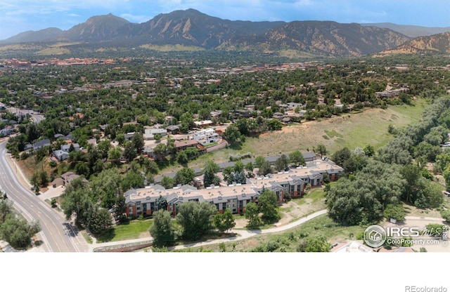 drone / aerial view featuring a mountain view