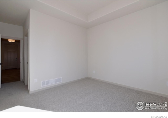 empty room featuring carpet