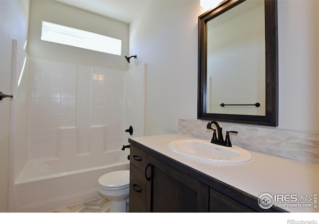 full bathroom featuring bathtub / shower combination, toilet, and vanity