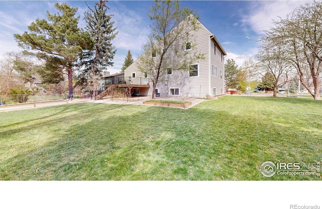 view of yard featuring a deck