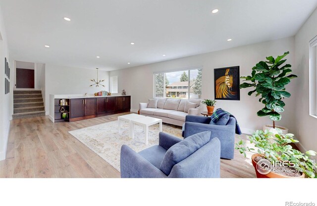 living room with light hardwood / wood-style floors