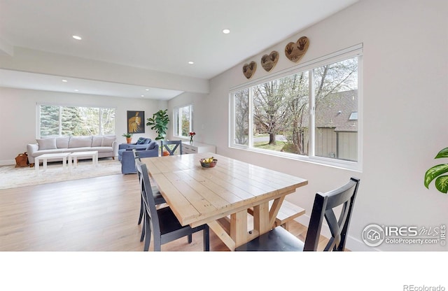 dining area with light wood-type flooring